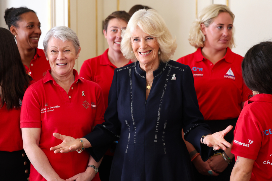 Queen Camilla, speaks to crew members as she hosts a reception for the 'Maiden' yachting crew, at Clarence House in London, to congratulate them on their unprecedented win of the Ocean Globe Race and becoming the first ever all-female crew to win an around-the-world yacht race